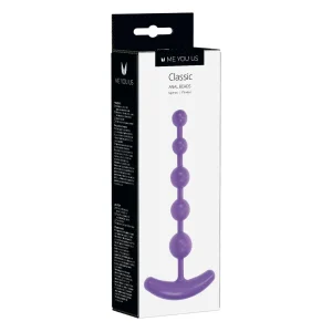 A mostly white box labeled "Me You Us Classic Anal Beads" displays purple, graduated spherical beads with a curved handle, designed for personal use. The packaging features black accents.