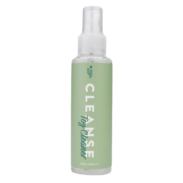 A clear plastic spray bottle with a light green label reading "Loving Joy Cleanse Toy Cleaner" in white and teal text, containing 100 ml (3.4 fl oz) of liquid.