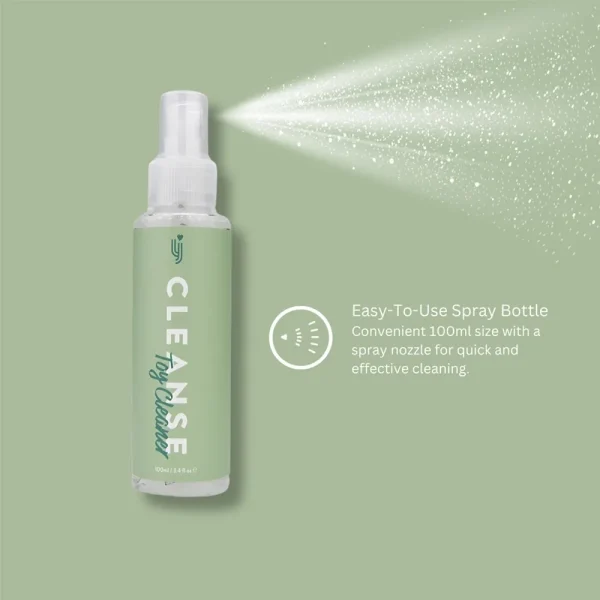 A green "Loving Joy Cleanse Toy Cleaner" spray bottle (100ml) sprays mist to the right. Text: "Easy-To-Use Spray Bottle—Convenient size with spray nozzle for quick, effective cleaning.