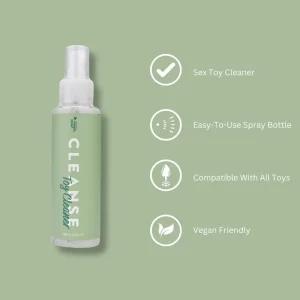 A spray bottle labeled "Loving Joy Cleanse Toy Cleaner" sits on a green background. Text highlights its features: sex toy cleaner, easy-to-use spray, suitable for all toys, and vegan friendly.