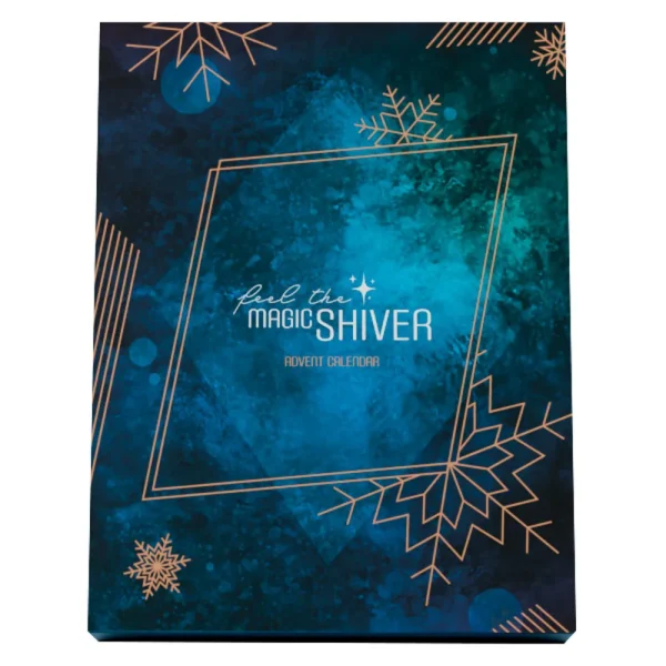 The Feel The Magic Shiver Erotic Advent Calendar 2025 features a rectangular design with a blue and teal background, gold geometric borders, and gold snowflake designs. "Feel the Magic Shiver Advent Calendar" is printed at the centre.