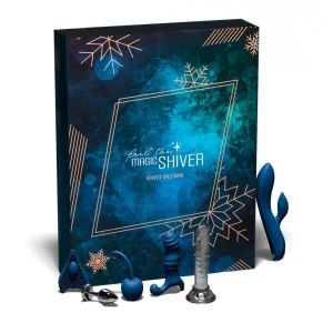 The Feel The Magic Shiver Erotic Advent Calendar 2025, in blue and teal with snowflake designs, stands behind several adult toys including a vibrator, anal plug, textured dildo, nipple clamps, and a beaded toy, which is some of the toys available in the sex calendar.