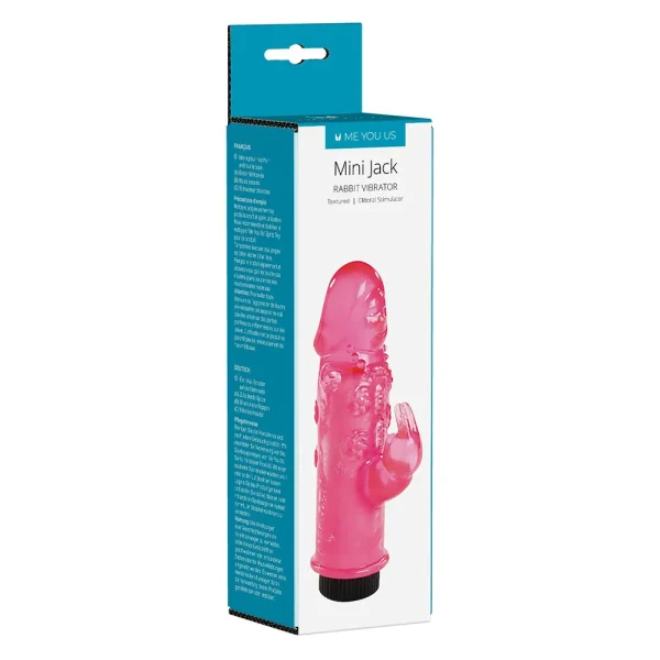 The retail packaging displays the Me You Us Mini Jack Rabbit Vibrator, featuring a pink vibrator with clitoral stimulator, product details, and branding on a white and teal background.