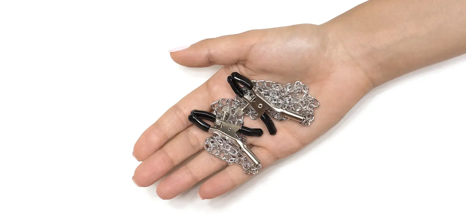 nipple-clamps-and-chain-in-hand nipple clamps and chain in hand