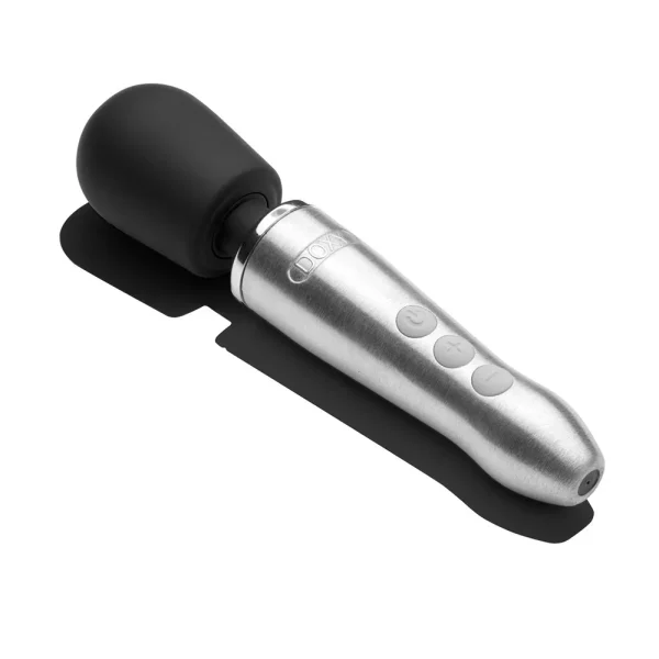The Doxy Go Rechargeable Travel-Friendly Wand Massager, featuring a silver and black design with a rounded head and three control buttons on the handle, is displayed on its side on a white background.