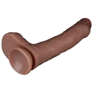 The Nature Cock 8.5 Inch Realistic Dual Layered Silicone Dildo is on its side, and shows the suction cup base at the bottom of the dildo.