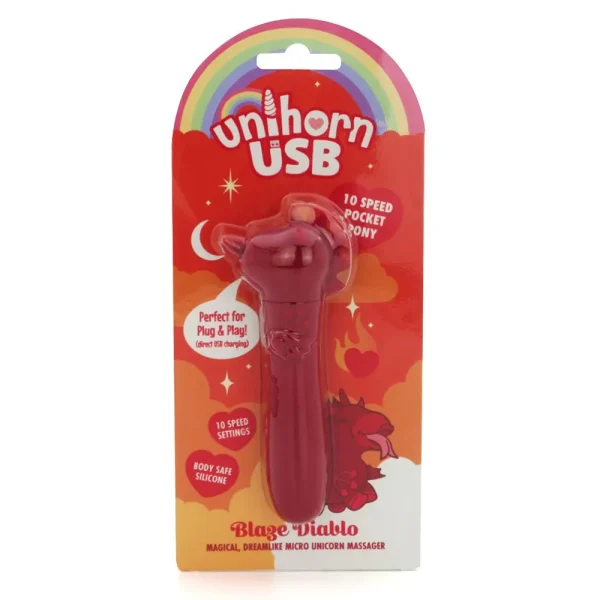The packaging for the Unihorn USB Blaze Diablo Unicorn Bullet Vibrator features a red unicorn design with 10 speed settings, compact size, and body-safe silicone. The background showcases a rainbow, moon, and stars.