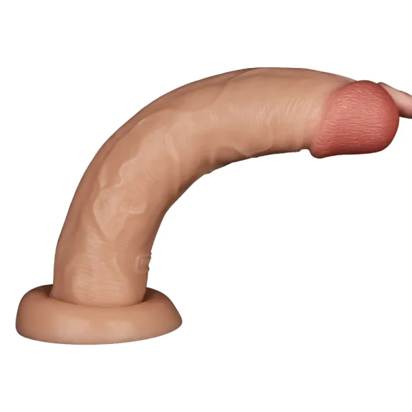 A finger bends the Power Basics 10 Inch Realistic Vibrating Dildo to show its flexibility.