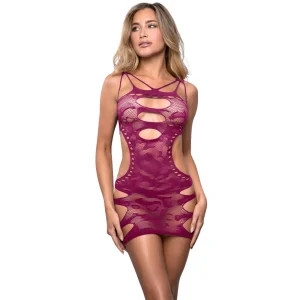A woman poses against a white background in the Fantasy Lingerie Vixen For The Thrill Dress, a revealing magenta mini dress with cut-out details and straps. She looks to the side, with hands resting on her thighs.