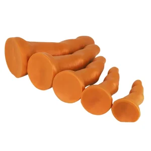 Five Midas Touch Gold Finger Silicone Dildos in various sizes are lined up side by side showing the suction cup bases on a plain white background.