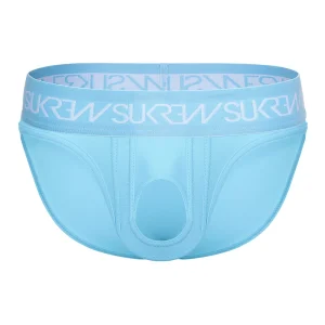 The Sukrew Breeze Blue U-Style Brief features light blue fabric, a wide waistband with "SUKREW" in white, and a contoured front pouch with a hole free hanging and comfort.