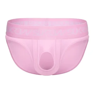 The Sukrew Summer Pink U-Style Brief features a light pink design, supportive pouch, with open front hole, and a wide waistband with subtle matching "SUKREW" branding.