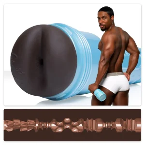 A muscular Deangelo Jackson in white underwear holds the Fleshjack Boys Deangelo Jackson 10/10 Signature Butt Masturbator, with a matching larger version behind him; below is a cross-section revealing its textured interior.