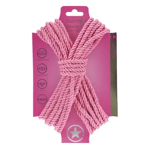 A neatly coiled pink Ouch 10 Metre Bondage Rope is displayed on matching pink backing with illustrations and branding, measuring 10 meters (32 feet).