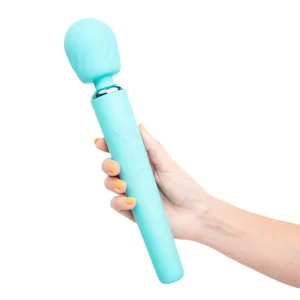 A hand with yellow-painted nails holds the Maia Toys Nala Rechargeable 10 Function Wand Vibrator, featuring a turquoise colour, rounded head, and button controls on the handle.