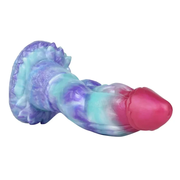 The Tyrannosaurus 10 Inch Fantasy Dinosaur Dildo features a pink tip, blue, purple, and white marbled silicone shaft, plus a textured base.