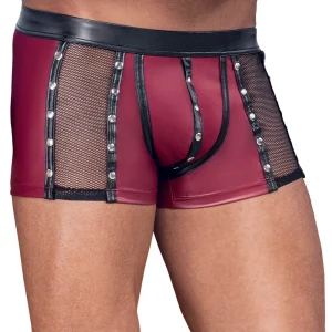 A person wearing NEK Wet Look Stud Pants: red boxer briefs with black mesh panels, black trim, metallic studs on the seams, and a bold, edgy fitted design.