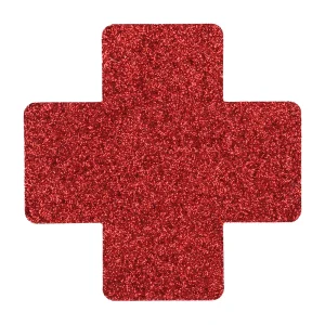 The Le Desir Nipple Cover Set features red, glittery nipple covers including crosses with rounded edges.