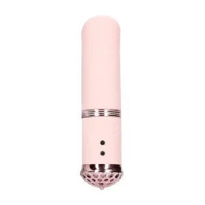 The Loveline Paris Collection Luxe Mini Lipstick Bullet Vibrator viewed from the back. It is a light pink, cylindrical lipstick style vibrator with a rounded top, a rose gold base with charging points.
