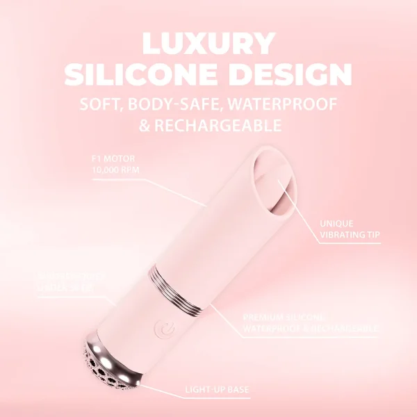 The Loveline Paris Collection Luxe Mini Lipstick Bullet Vibrator, in pink silicone, is shown on a soft pink background with text highlighting its vibrating tip, light-up base, whisper-quiet function, and waterproof, rechargeable design.
