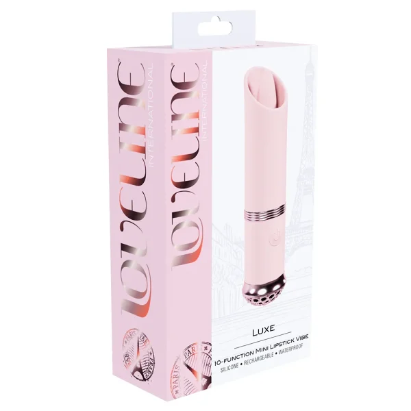 A pink retail box labeled "Loveline Paris Collection Luxe Mini Lipstick Bullet Vibrator" showcases a mini lipstick-shaped vibe with an Eiffel Tower graphic and highlights features like silicone, rechargeable, and waterproof.