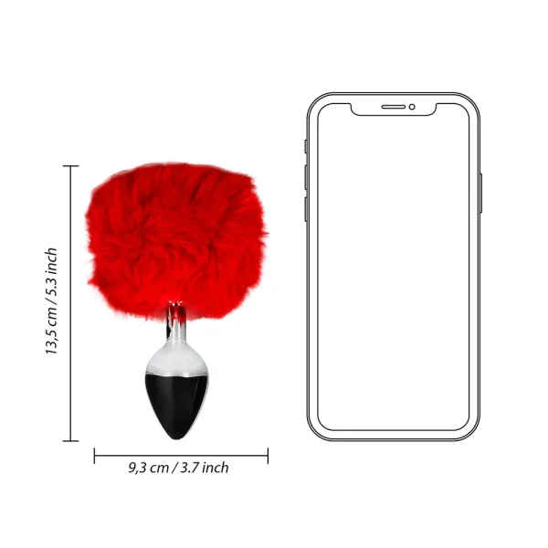 The Ouch Bunny Tail Metal Butt Plug, shown in silver with a fluffy red tail beside a smartphone for scale, measures 13.5 cm (5.3 in) tall and 9.3 cm (3.7 in) wide.