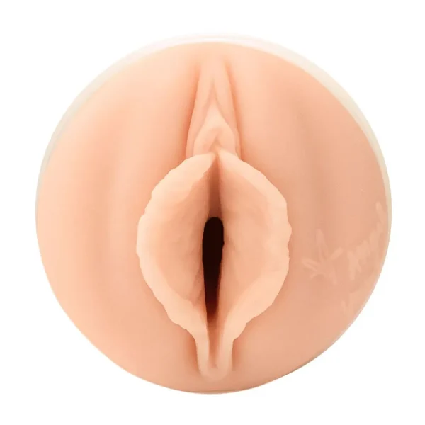 The Fleshlight Girls Angel Youngs Sweetness Texture Masturbator, a sex toy modelled to resemble a vulva of Angel Youngs, is shown from a top-down view against a white background.