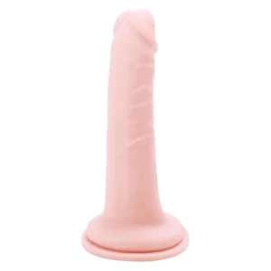 The Me You Us Ultra Cock 6.5 Inch Realistic Dildo, in a lifelike flesh tone dildo with a suction cup base, stands upright against a plain white background.