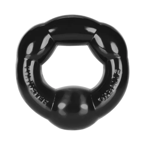 The Oxballs Thruster Cock Ring is a shiny black, thick stretchy ring, embossed text, glossy finish, and smooth texture, designed for durability.