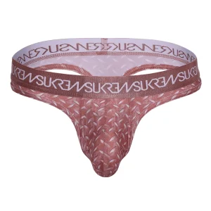 The Sukrew Diamond Classic Thong is a patterned, reddish-brown thong with metal details and a thick waistband featuring the repeated "SUKREW" brand name in white.
