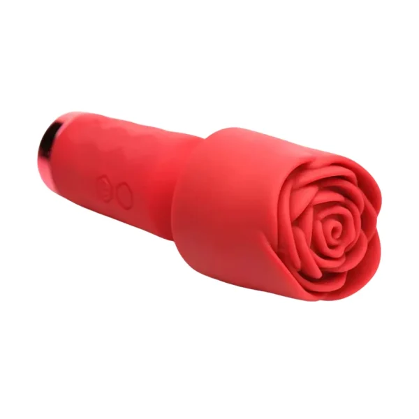 The Bloomgasm Pleasure Rose Petite Mini Silicone Rose Wand is a red silicone wand with a textured cylindrical handle and a flower-like top, resembling a rosebud.