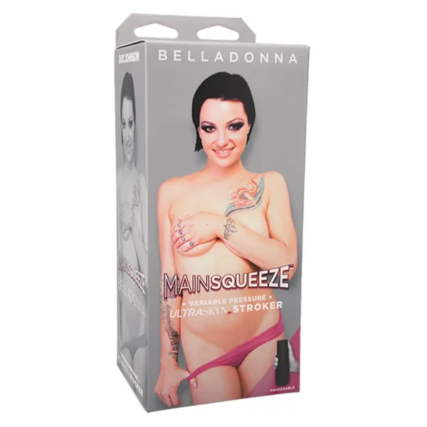The Doc Johnson Main Squeeze Belladonna UltraSkyn Stroker box shows a tattooed Belladonna covering her chest with one hand and lowering pink knickers with the other; "Belladonna" is displayed at the top.