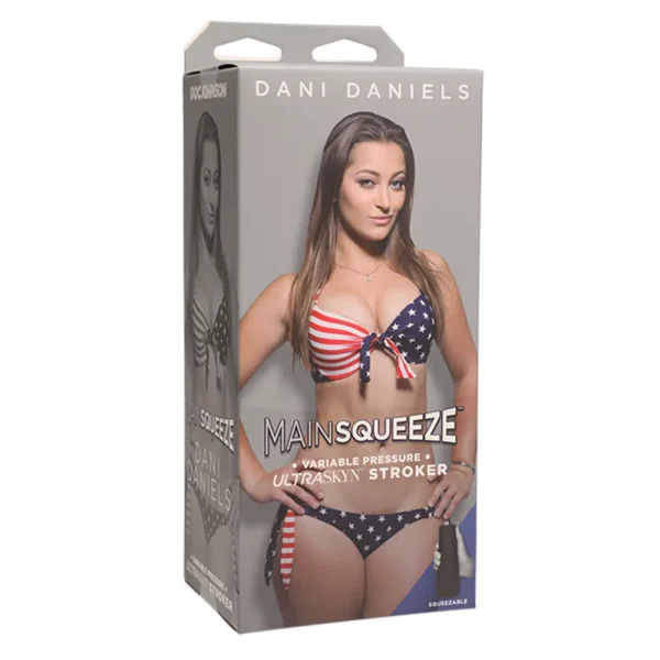 A mostly grey product box displays Dani Daniels in a stars and stripes bikini, with "Doc Johnson Main Squeeze Dani Daniels UltraSkyn Stroker" written on the front along with product details.