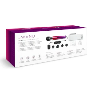Back of the product box for the Le Wand Diecast Plug In Vibrating Wand Massager displays the product image, features, and included accessories, attachments and a storage bag, against a white and purple background.