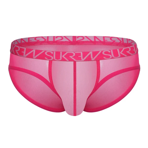 The Sukrew Electric Pink Low-Rise Brief features bright pink mesh, a contoured pouch, neon pink trim, and a bold waistband with the “SURE” logo in large, repeating white letters.