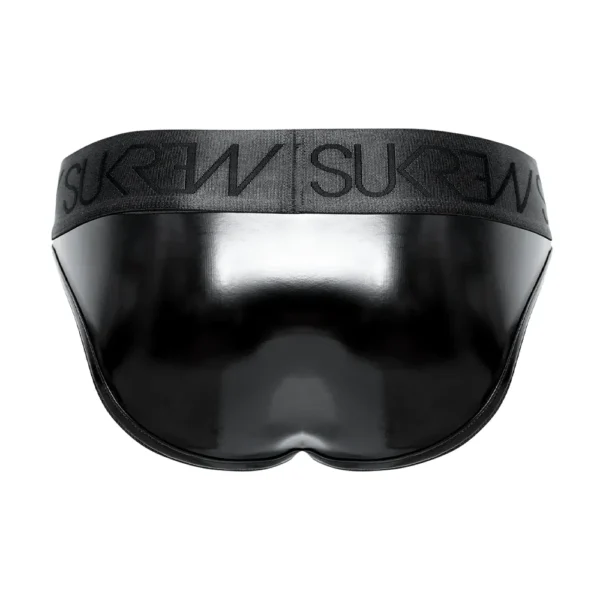 The Sukrew Fetish Black Wet Look Classic Brief features a glossy black finish and a wide elastic waistband with the "SUKREW" logo, shown from the back against a white background.