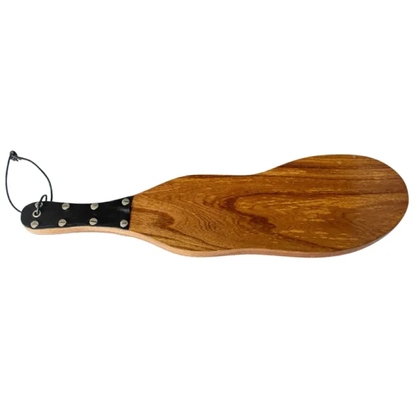 The back of the Wooden Boot Imprint Paddle features a rounded wooden blade, a handle reinforced with a black faux leather strap and metal rivets, plus a black cord loop on the handle for convenient hanging.