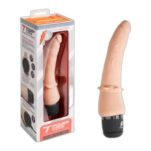 A realistic, flesh-coloured vibrator with a pronounced tip and veins, shown both inside its packaging and outside. The packaging is labelled "7'' Power Cock" and displays product features and branding.