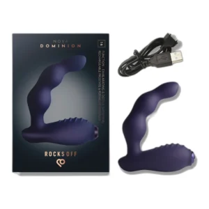 A purple prostate massager is shown next to its box, labelled "Rocks Off Nova Dominion," along with a USB charging cable. The device has a curved design and textured surface.