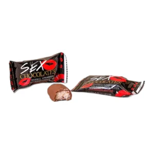 Two black-wrapped chocolates labelled "SEX CHOCOLATES" with red lips on the packaging; one chocolate is whole, and the other is unwrapped with a bite taken out, revealing a creamy filling.