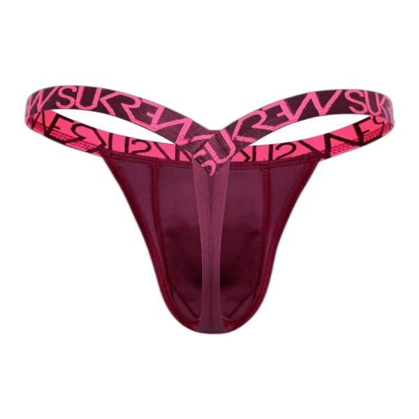 A maroon thong with wide pink elastic waistband featuring bold black "SUKREW" lettering. The waistband forms a V-shape above the hips, and the fabric has a smooth, fitted design.