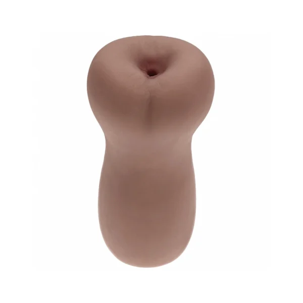 A brown, cylindrical object with a rounded top featuring a small central opening, resembling a silicone or rubber toy, photographed against a white background.