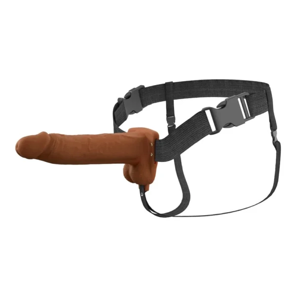 A brown strap-on dildo with adjustable black straps and plastic buckles, designed to be worn around the waist and hips.