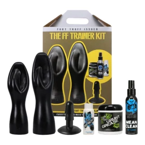A kit with two black rubber hand-shaped trainers, a small black plug, cleaning spray, jar of grease, and cream, displayed in front of a yellow and grey box labelled "The FF Trainer Kit.
