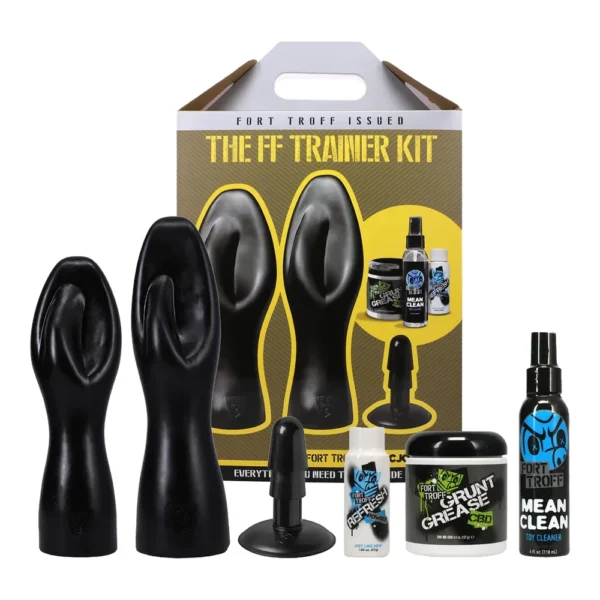 fort-troff-ff-trainer-1 A kit with two black rubber hand-shaped trainers, a small black plug, cleaning spray, jar of grease, and cream, displayed in front of a yellow and grey box labelled "The FF Trainer Kit.