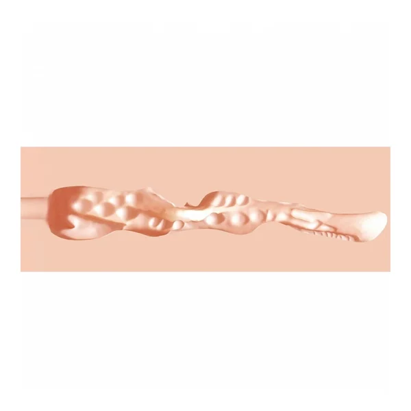 A close-up image of a light pink, textured object with irregular bumps and grooves, set against a solid pale pink background.