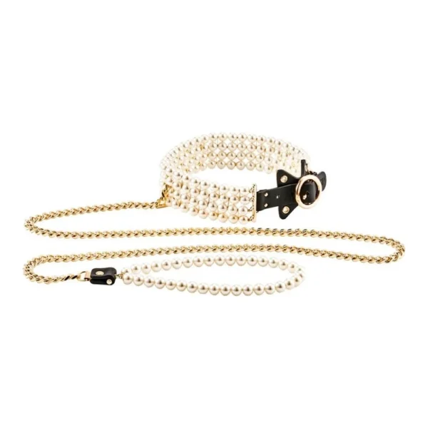A pearl-studded collar with a gold chain lead attached. The collar features multiple rows of pearls, a black leather accent, and gold fittings, resulting in an elegant and luxurious appearance.