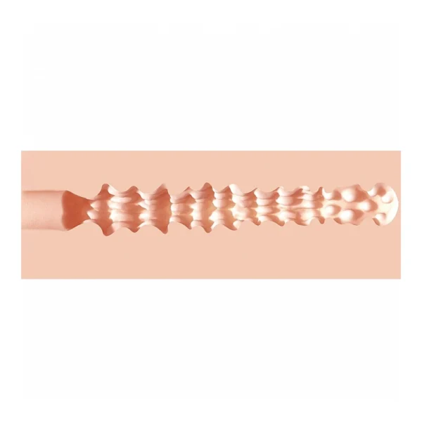 A close-up of a textured, flesh-coloured rod with raised bumps and ridges along its length, set against a light peach background.
