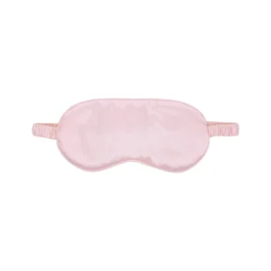 A light pink silk sleep mask with an elastic strap, displayed on a plain white background.