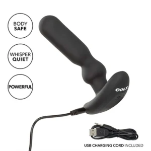 Black, curved vibrating device labelled “COLT” with attached USB charging cord. Text bubbles state: “Body Safe,” “Whisper Quiet,” and “Powerful.” A detached USB lead is shown below.
